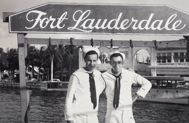 Walter Reed Parpart Jr. (right), the radioman on one of the missing planes, poses in front of a Fort Lauderdale sign in 1945